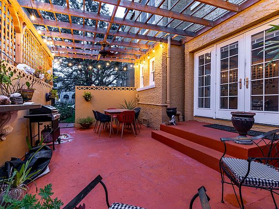 Side of house with pergola