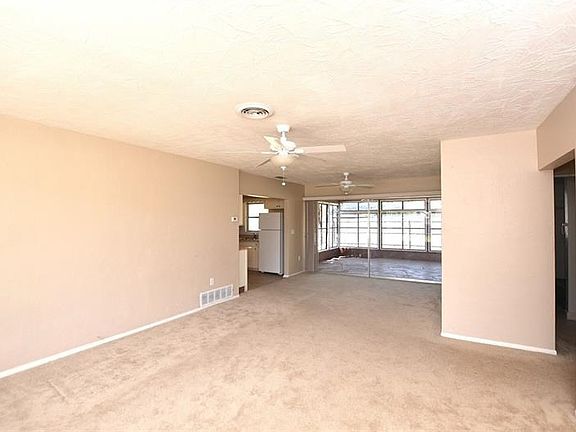 Living/dining area with access to spacious lanai.