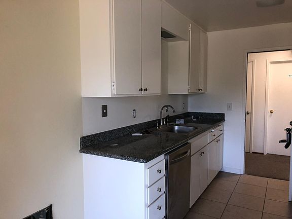 Kitchen looking out door to the hall way.