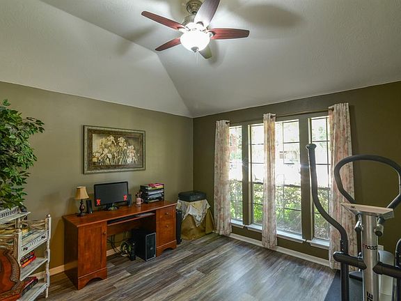 Enter your double doors to your study and notice all the natural light.