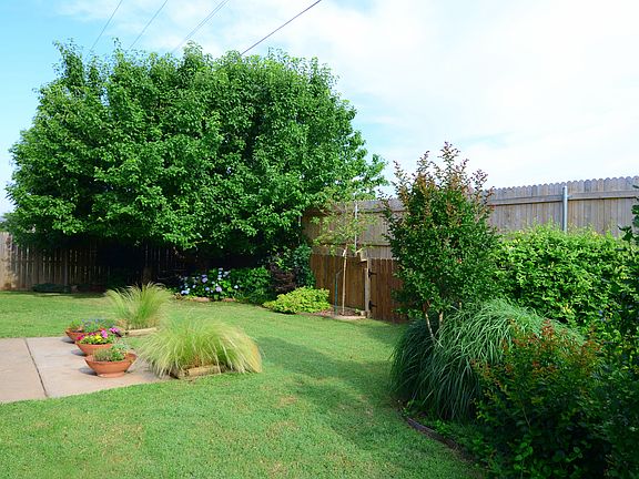Peaceful and beautifully landscaped back yard. 