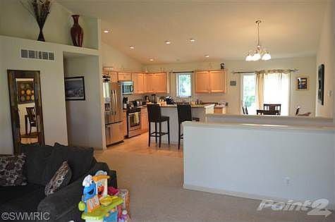 Open living room/dining area/kitchen for easy entertaining and living!