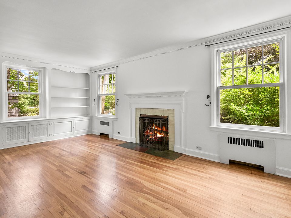 Formal living room with fireplace to enjoy during the winter months.