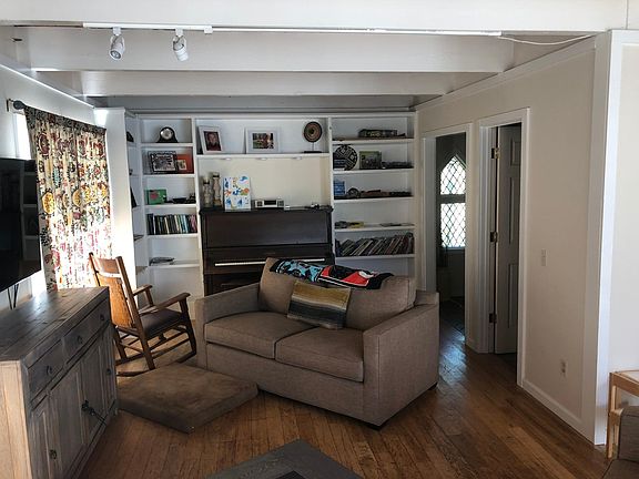 Living room with piano