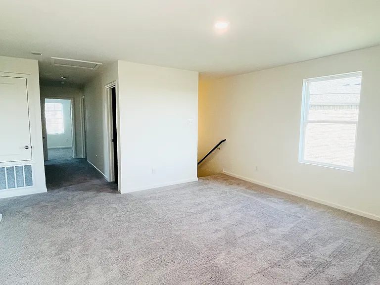 Loft showing stairs, door of full Bathroom-2 and access to Bedrooms 2, 3 and 4