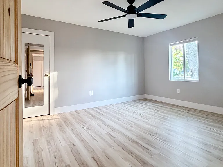 Four additional spacious bedrooms 4/6 of varying sizes, each with ceiling fan and excellent natural light