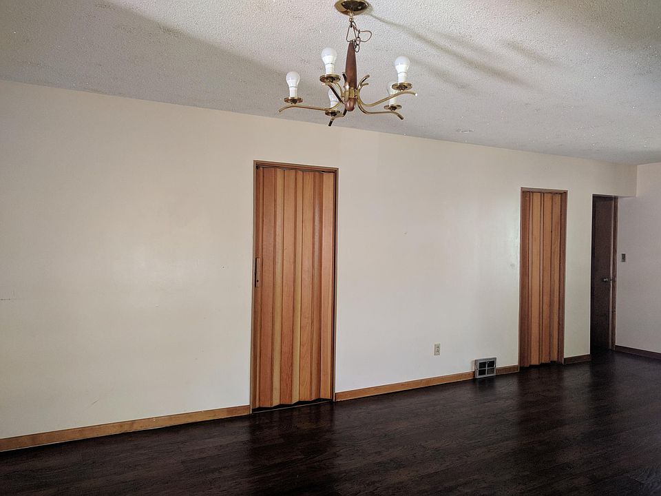 Two bedrooms near the entrance of the house