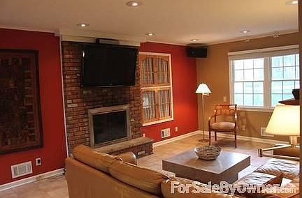 Family room with working fireplace
						:
						Widescreen TV and surround sound included. Built-in computer/media center.