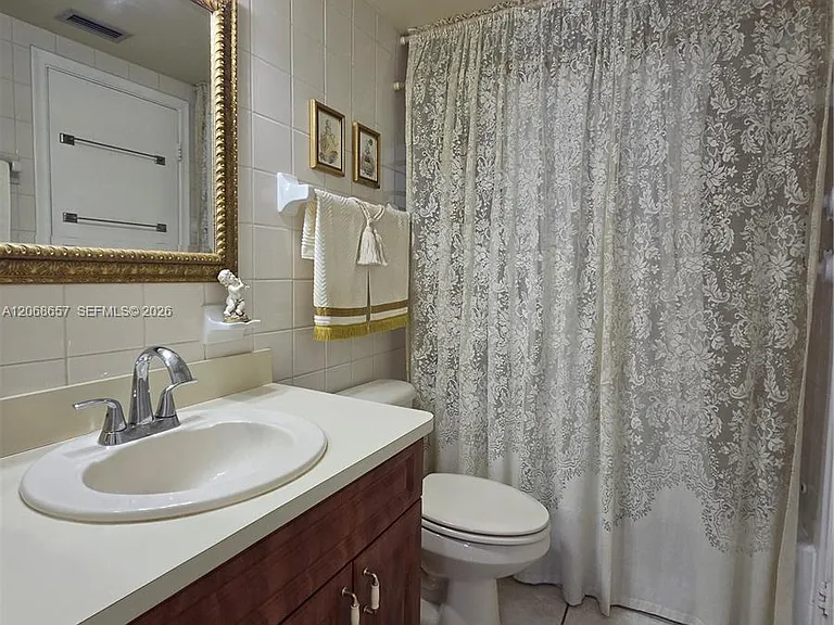 7707 Camino Real #B-209 — Photo 21