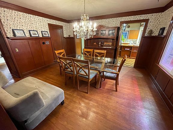 100 year old formal dining room with large pantry and built in cabinetry