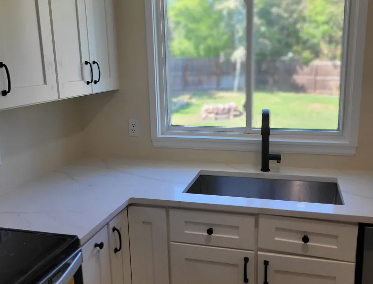 New cabinets and new quartz countertops.