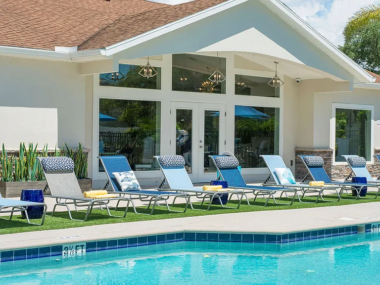 Indulge in tranquil moments lounging on our luminous pool deck.