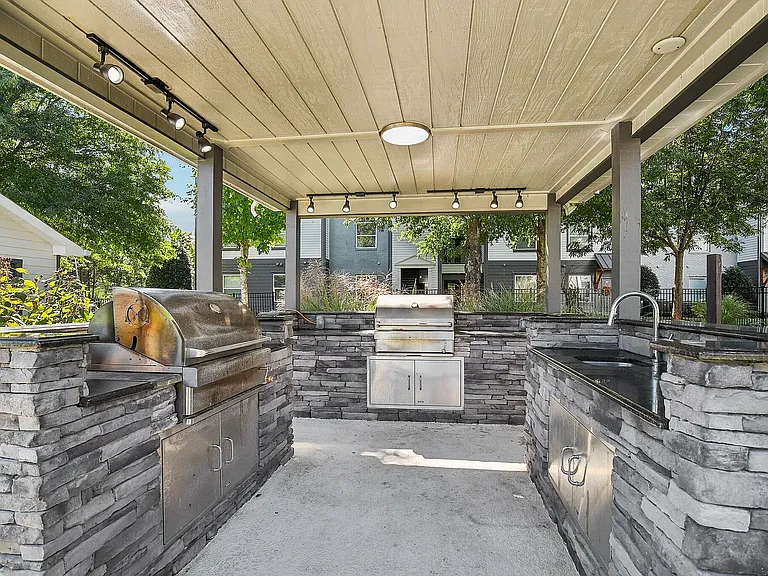 Grill and chill by the pool at our outdoor grilling station