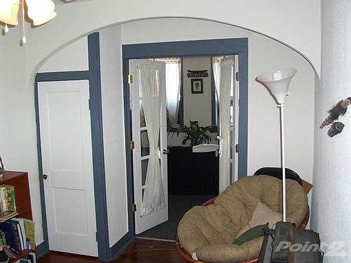 French Doors leading into 2nd bedroom
