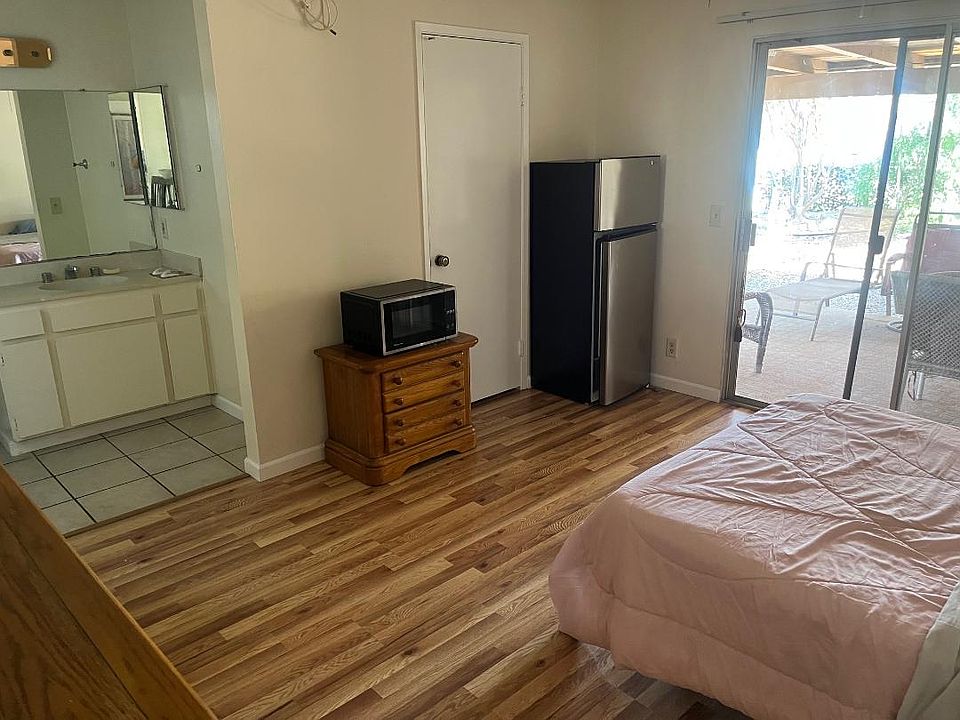 Primary room with Micro and Refrigerator and walk in closet