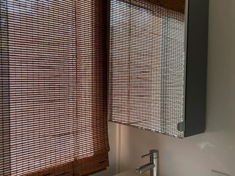 Bamboo blinds come with the unit.