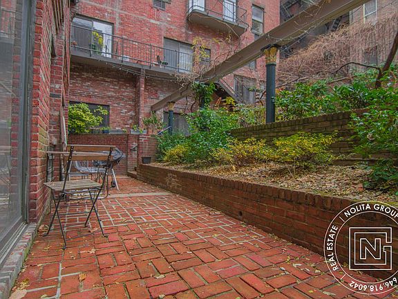 3rd image of 201 E 12th St APT Gdn3
