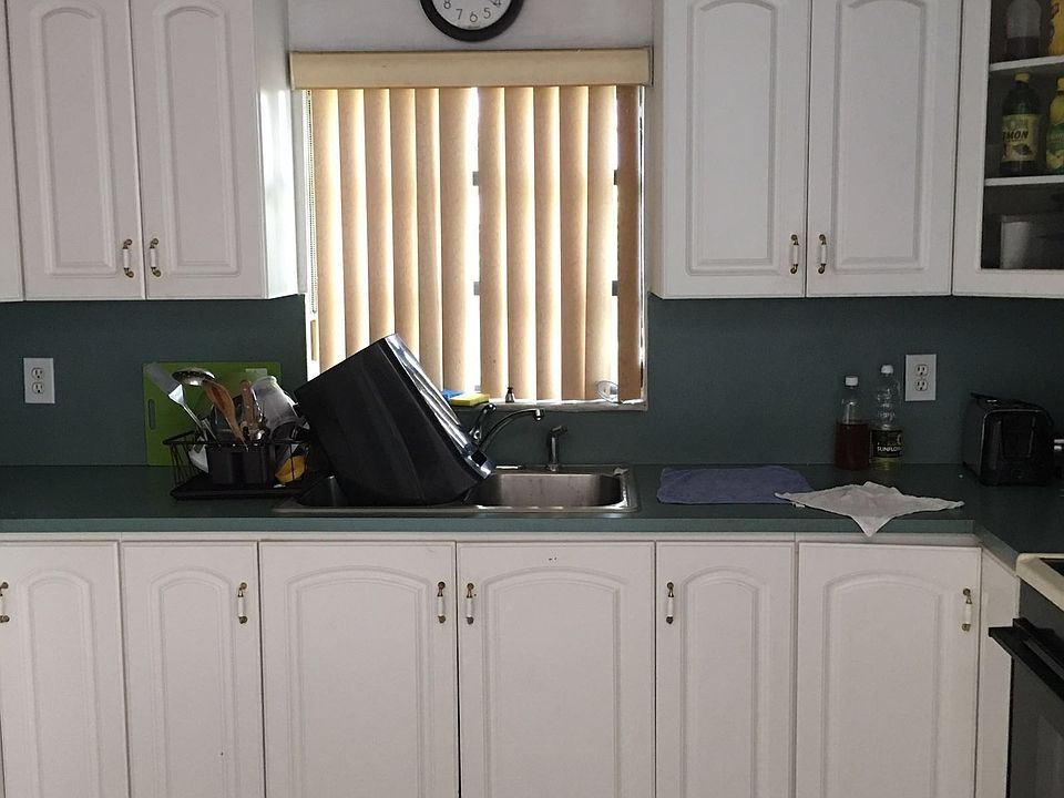 the fridge needs to be scrapped and repainted.