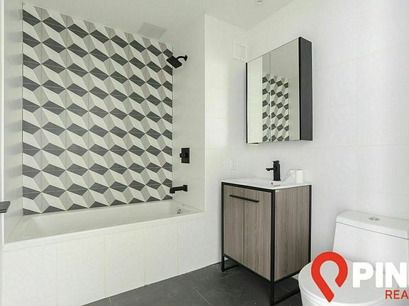 3rd image of 323 E 19th St APT 2A