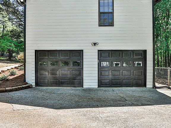Park with ease in our spacious 2-car garage equipped with brand-new garage door openers for added security and convenience. There is additionally wide driveway that can accommodate an additional 3-4 cars, offering ample parking space for all vehicles