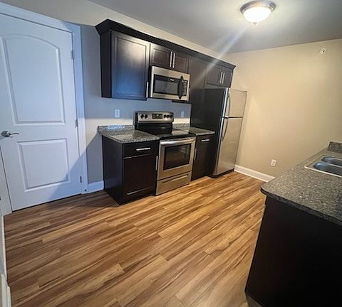 Entry into kitchen - closet for storage