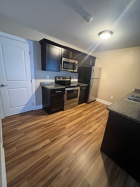 Entry into kitchen - closet for storage