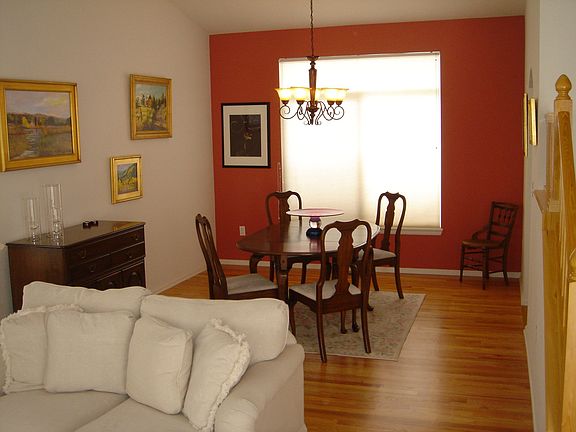 Separate formal dining room just off the kitchen with hardwood floors-EZ care.
