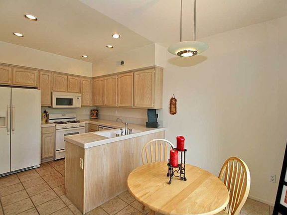 SPACIOUS KITCHEN AND DINETTE.
