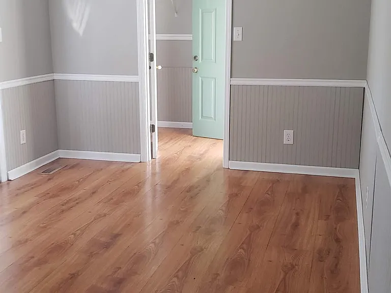 Kitchen/Dining Room Combination Area, lots of light, freshly painted; door entrance to laundry room and to carport.
