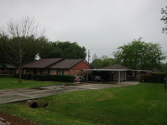 large carport,long driveway,detached 2 car garage