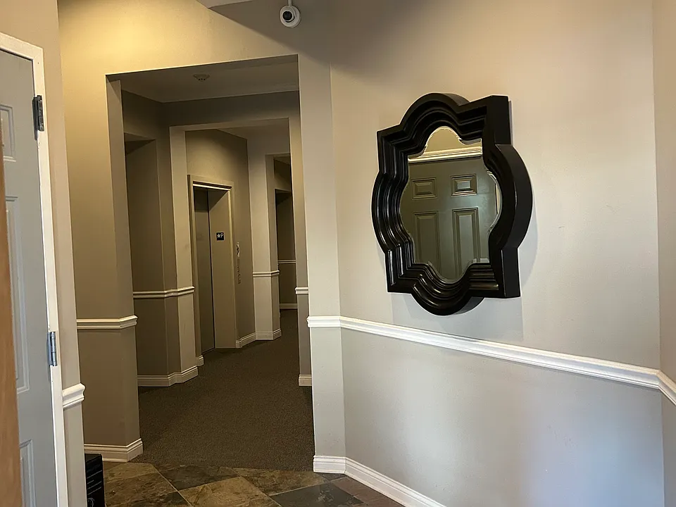 Secured entry via hallway to the unit