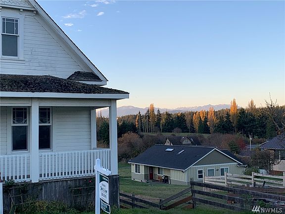View from front door through dining room to kitchen.