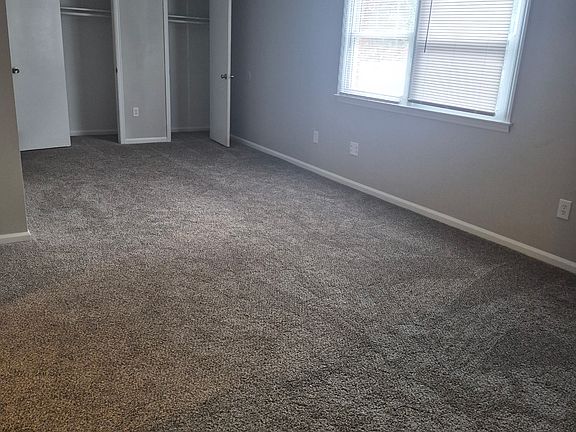 Large living area with double closet space.