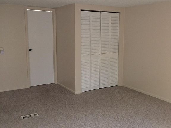 Master end with closet and bathroom door