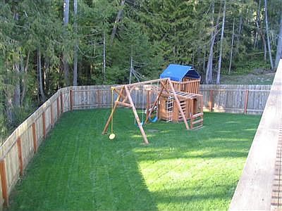 Fenced Yard with Big Toy