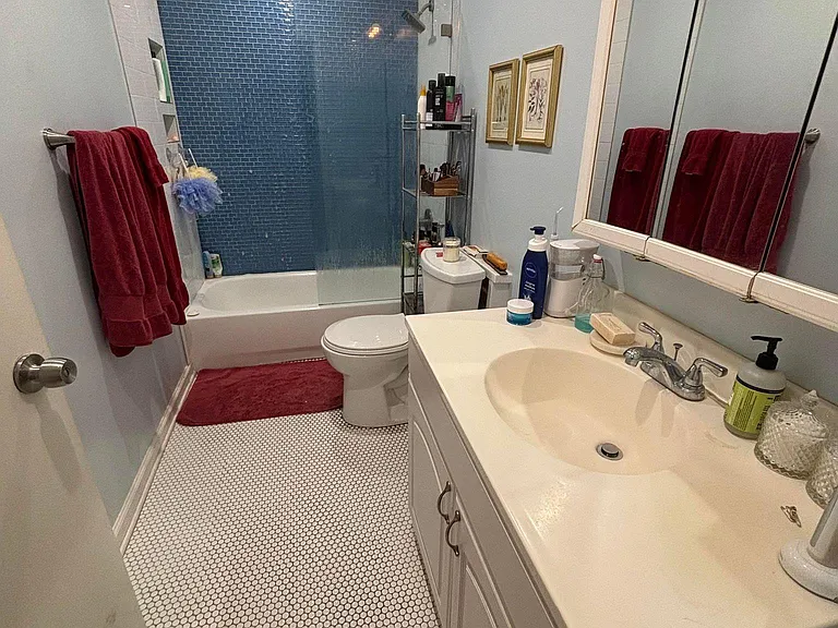 Full bath across from bedroom 3.