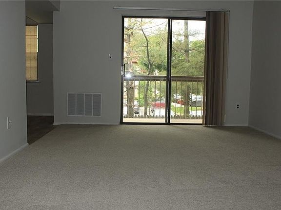 LIVING ROOM (PHOTO TAKEN PRIOR TO RENOVATION)