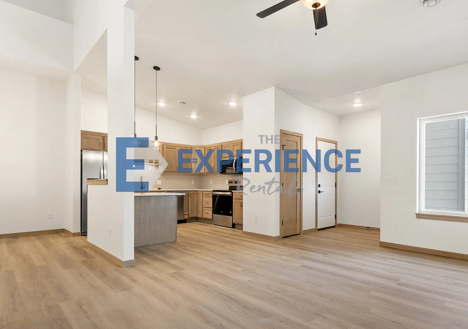 Brand-New 3-Bedroom Townhome with Lofted Living Space! — Photo 1