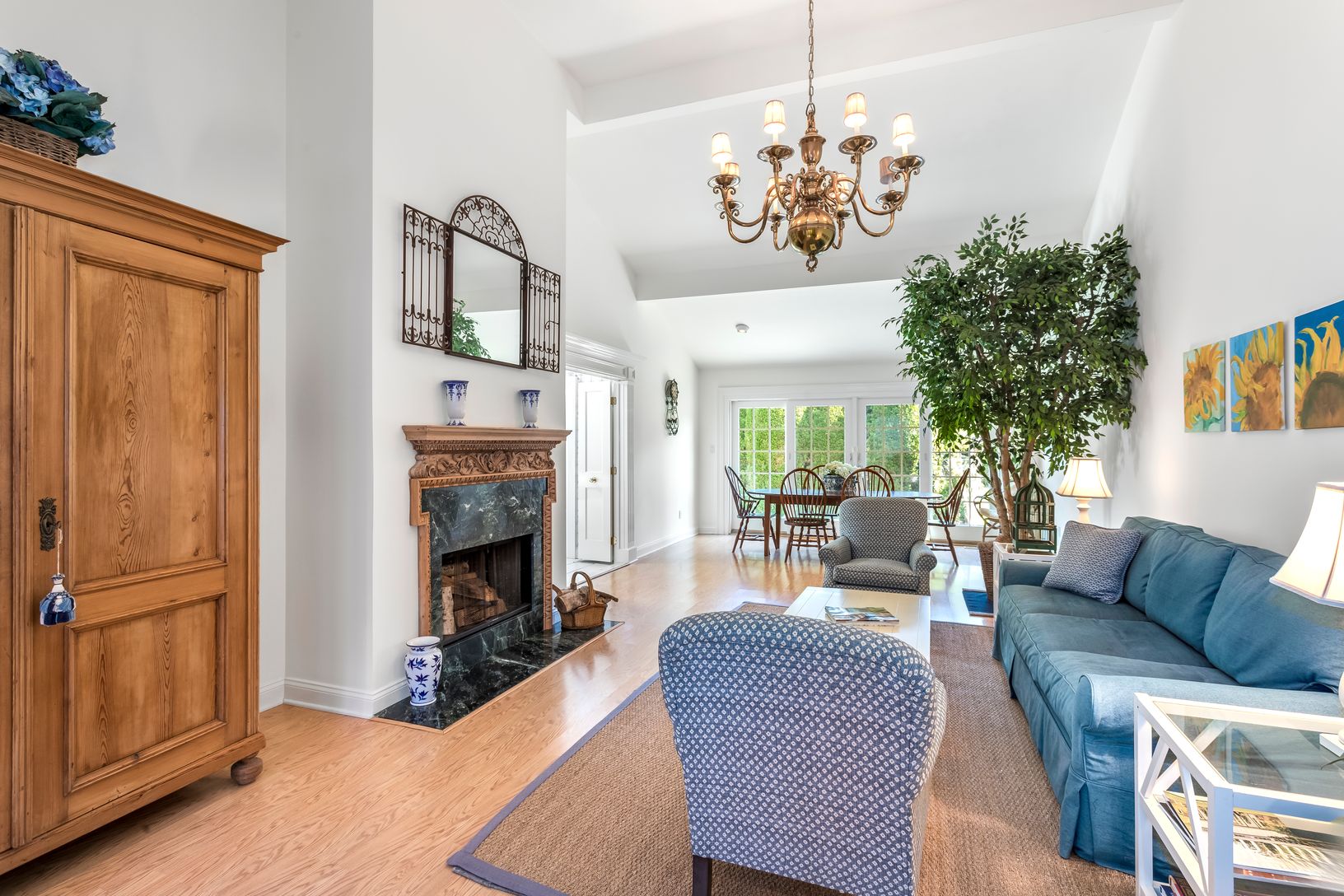 Open Living with High Ceilings & Wood-burning Fireplace