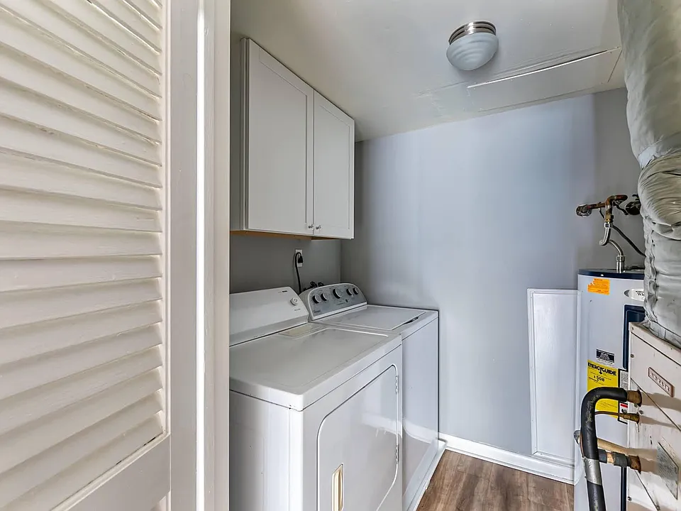 laundry room located off kitchen