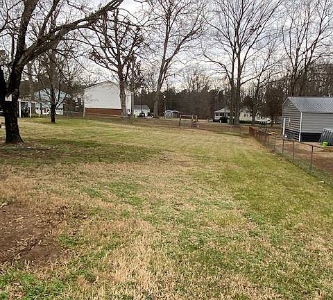Huge back yard with dog run at back of property