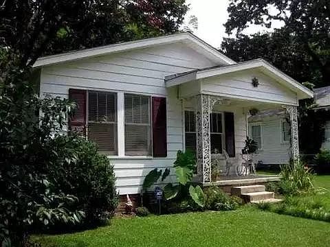 Front left - large oak tree coverage of back and side yard.