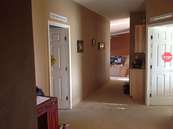 Hallway outside two bedrooms