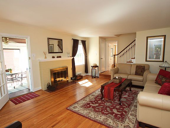 Beautiful hardwoods, fireplace, sun porch
