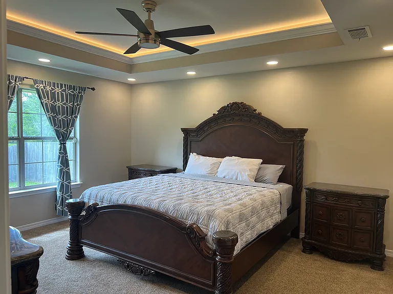 Owner Suite Bedroom with recess, lighting, as well as a coffered lighting in the Crawford ceiling