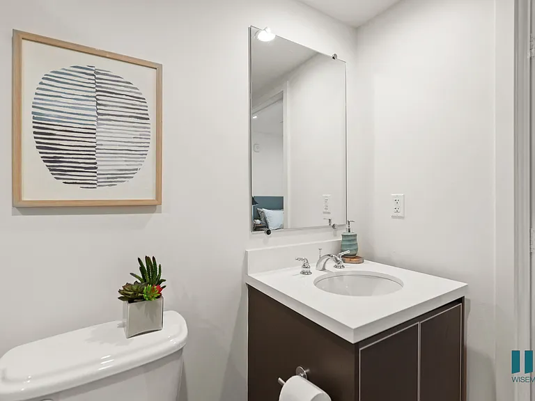 Bathroom with Vanity Cabinet Storage and Toilet