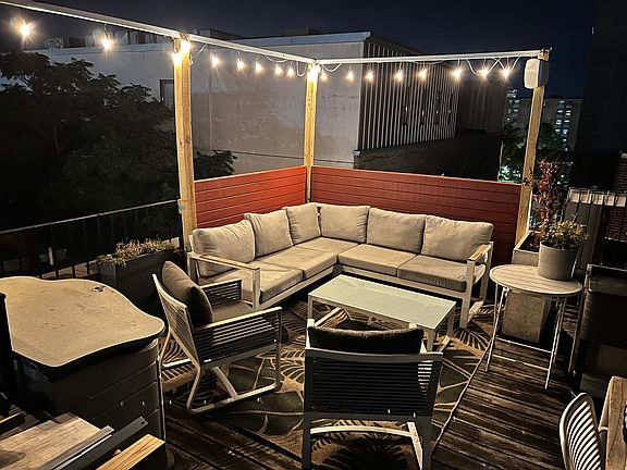 Private roof deck at night.