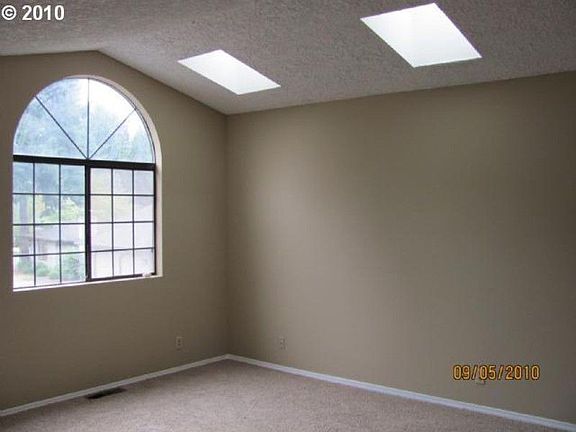 5th image of 406 NE Hearthwood Blvd