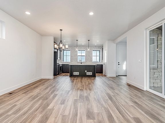 21688 E. 61st - Living Room and Kitchen