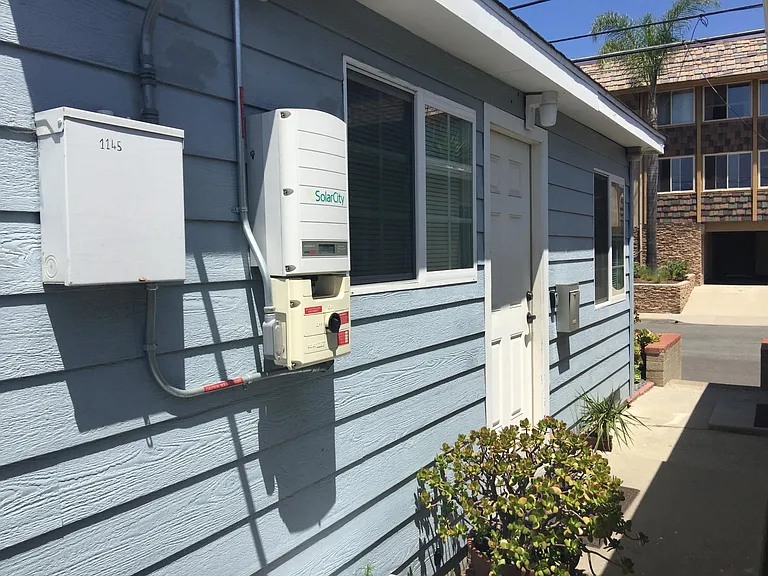 Side entrance from Riley Street. Showing Solar Panel Control.